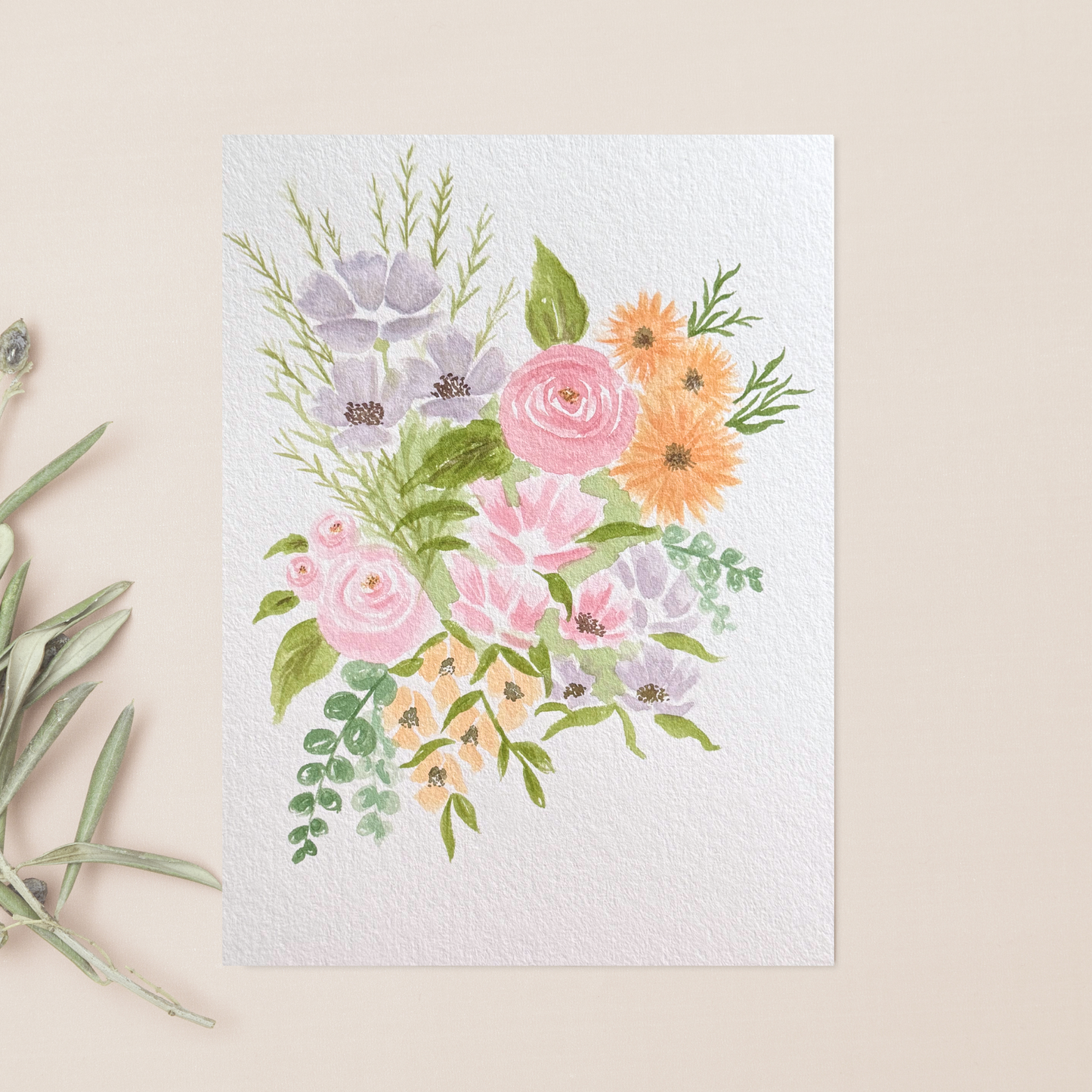 Lavender & Blush Watercolor Floral Painting hanging with real flowers.