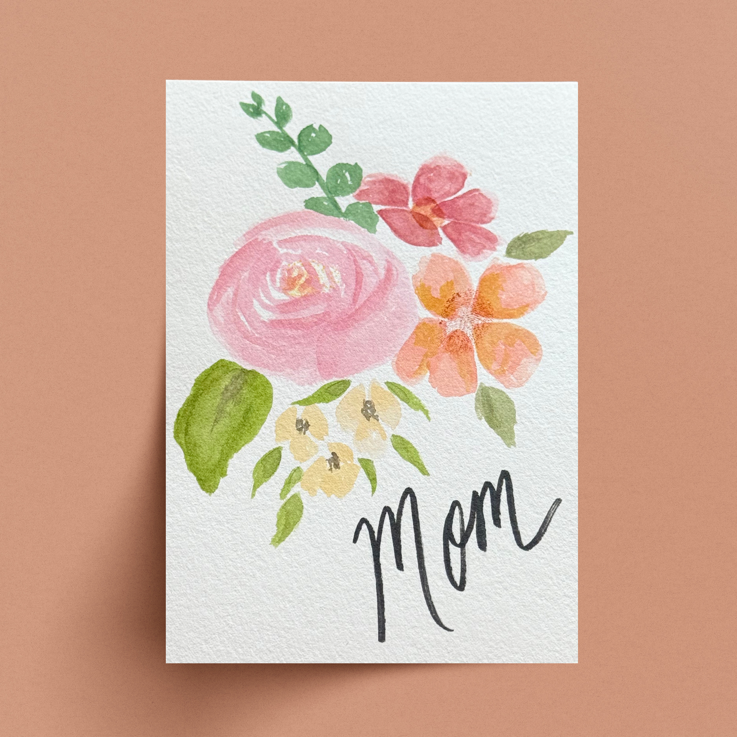 Custom watercolor floral painting with Mom name on terracotta background.