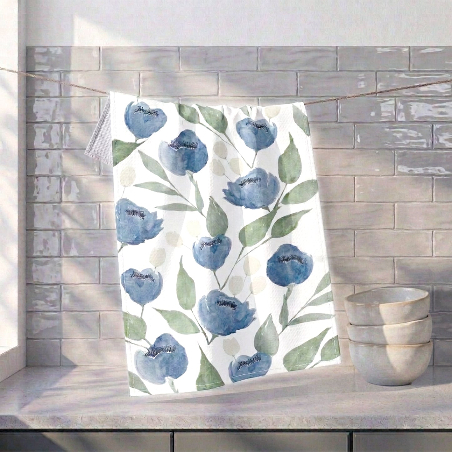 Indigo Garden watercolor floral tea towel hanging in kitchen setting — 723 & Co. Design Studio