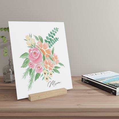 Barely Blush personalized watercolor fingerprint art print on oak gallery stand on table