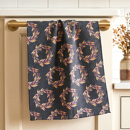 Harvest Wreath watercolor tea towel draped over warm oak cabinet with brass knob — fall kitchen linen by 723 & Co. Design Studio 