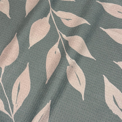 Close up detail of Sage Wild Leaves watercolor tea towel showing oversized warm taupe leaf silhouettes on slate green, 723 & Co. Design Studio