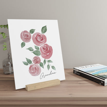 Floral print with 'Grandma' on a wooden stand against a neutral background